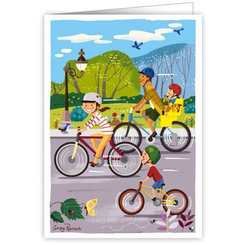 Kartenfamilie auf einer Fahrradreise